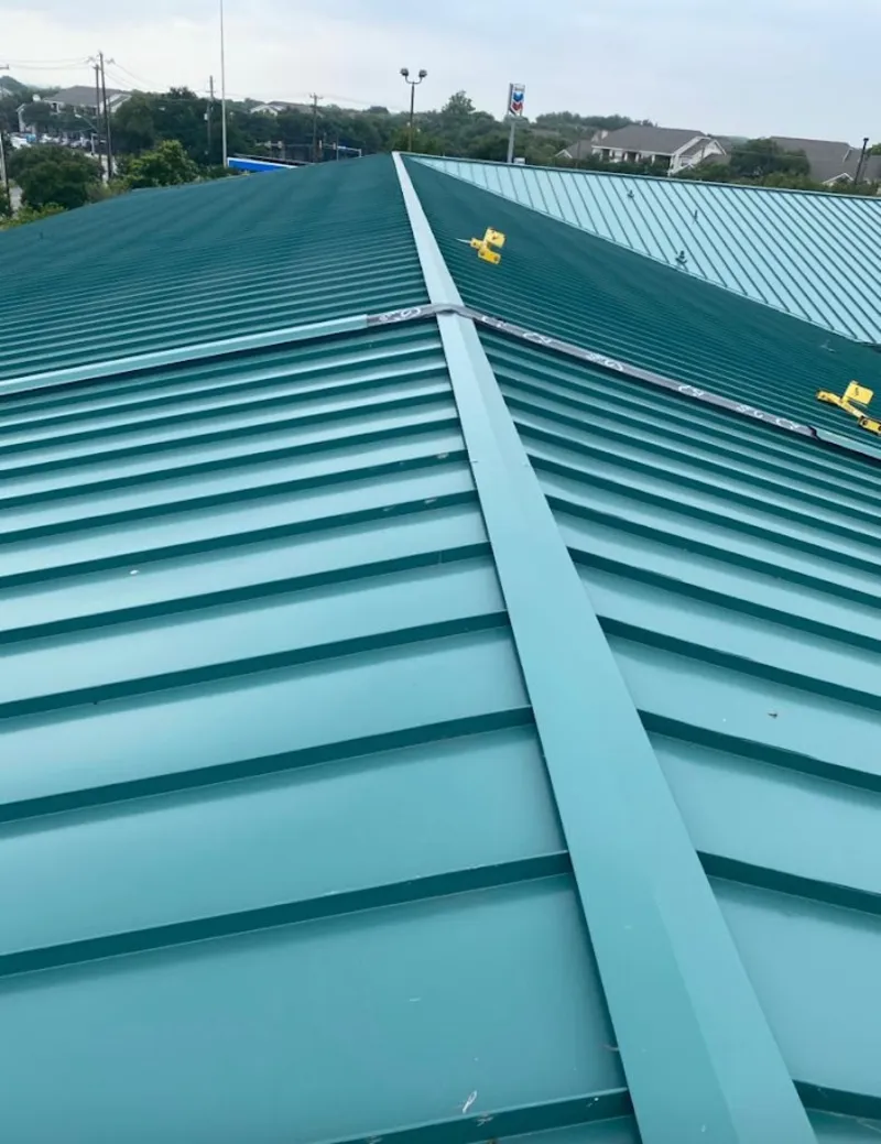 Green commercial metal roof ridge and valley for Metal Roof Repair in Sandy Springs